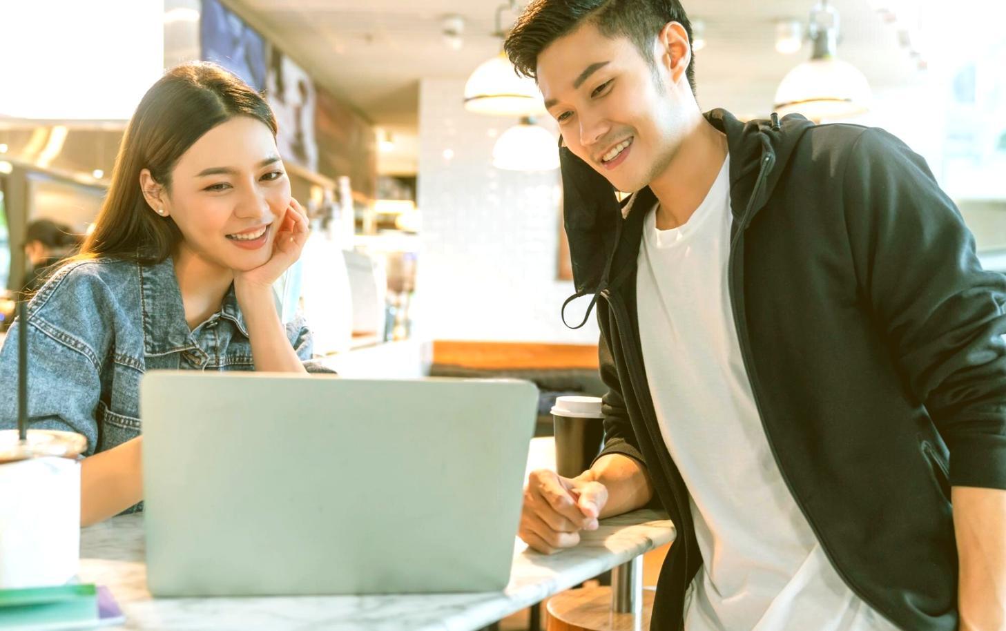 Database administration workspace with multiple monitors displaying query optimization and performance metrics